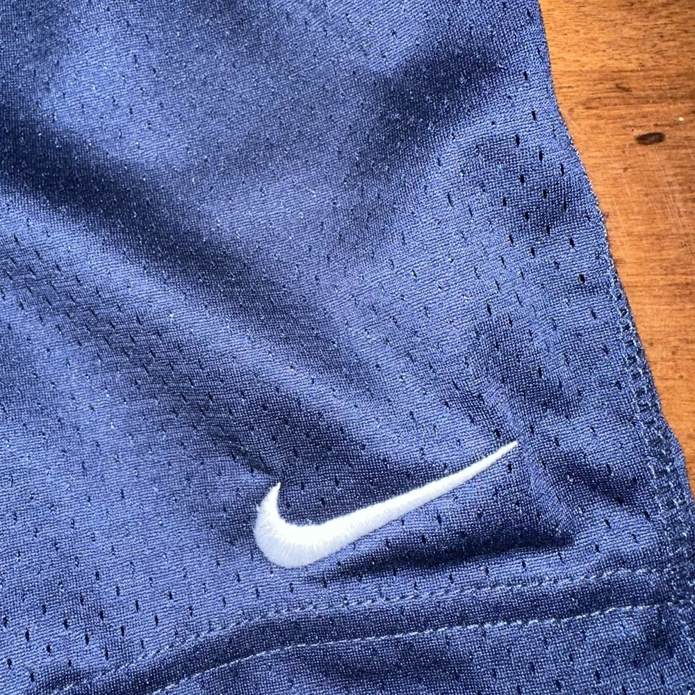 Nike gender neutral athletic navy blue shorts just do it